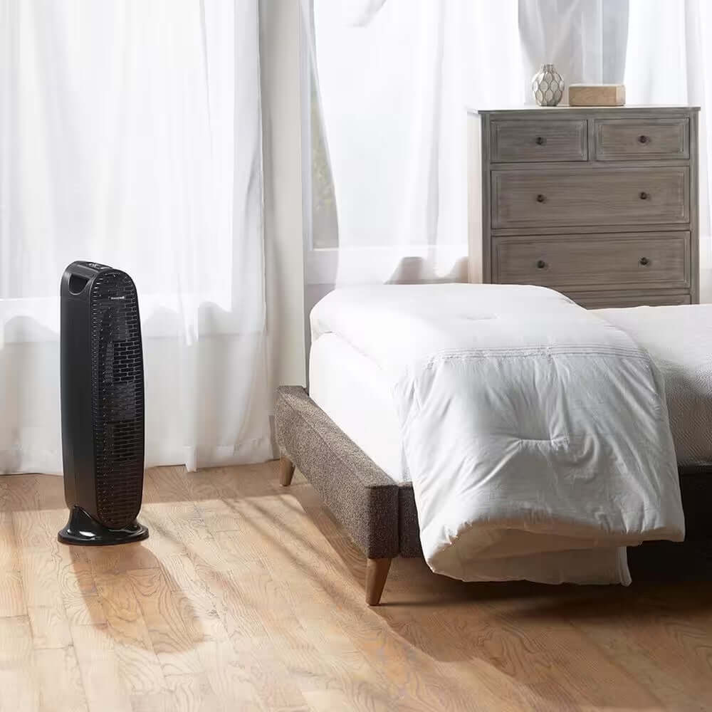 Tower air purifier, quiet for small to medium rooms, allergy relief, energy-saving.